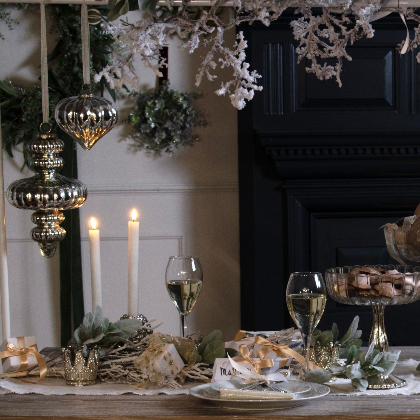 Highlighting the Large Antique Silver Vallupe Bauble as a standout piece hanging at a Christmas Dining setting.