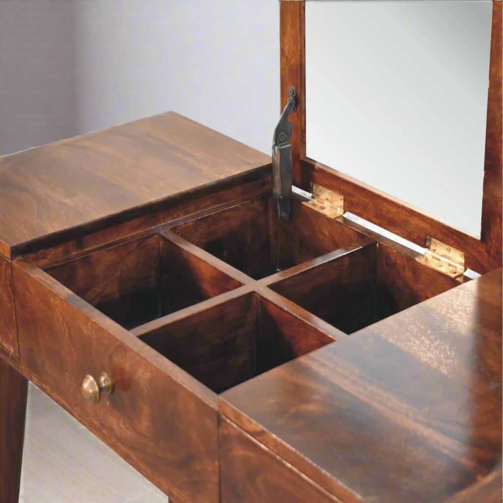 Close angle view of the rounded dressing table, with california walnut finish, showcasing the fold-up mirror open, revealing storage compartments.