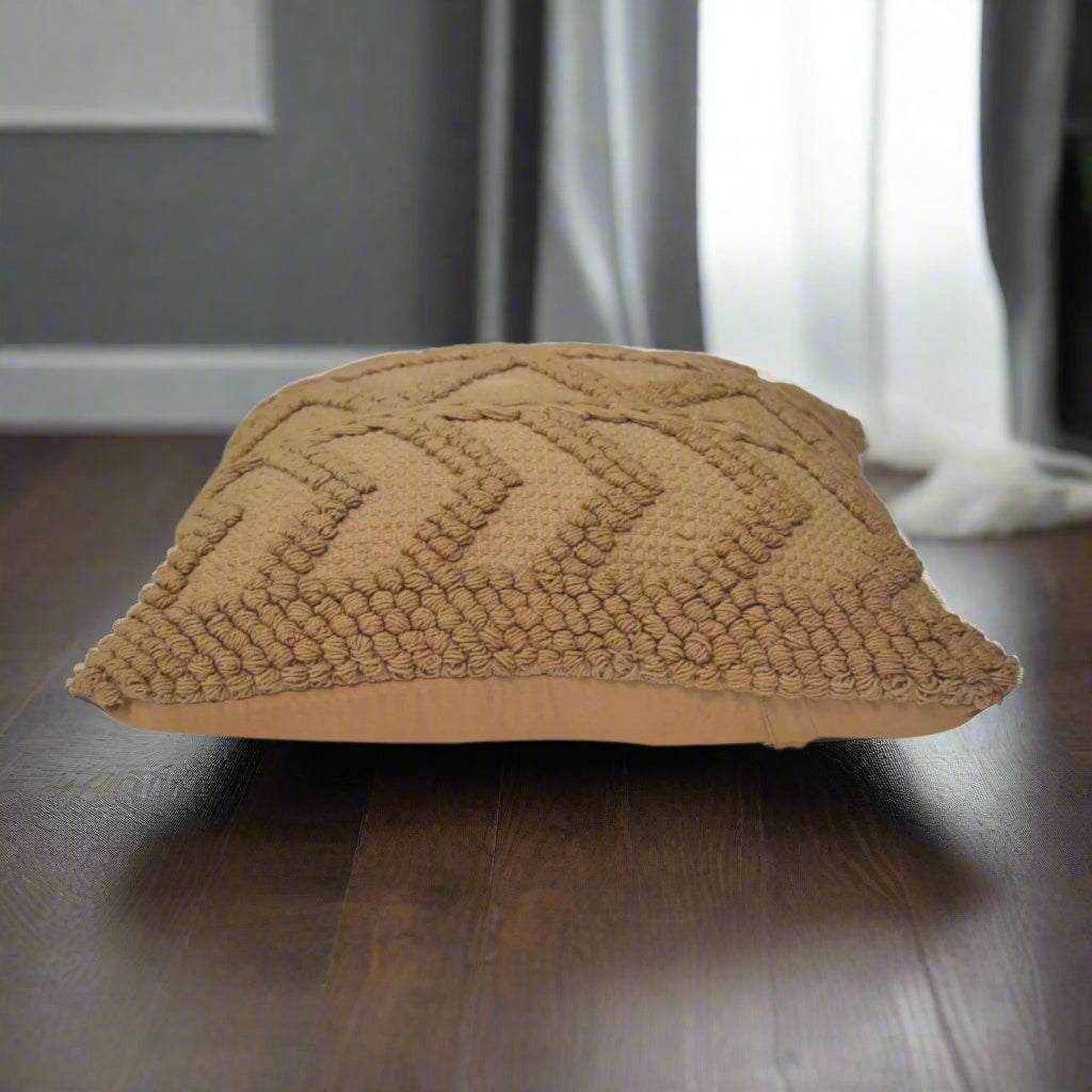 Horizontal view of the Alda coffee cushion showing the zig-zag design, and the filling size.