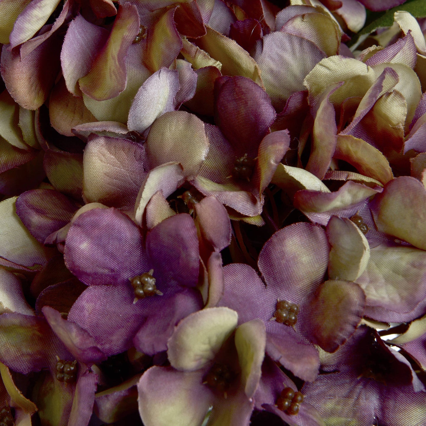 Close-up of artificial burgundy hydrangea petals – detailed finish in rich autumn tones.