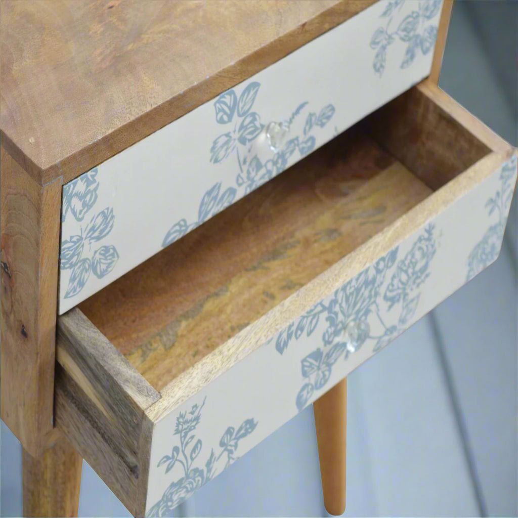 Top-down view of the Blue Floral Screen Print Bedside Table with the bottom drawer pulled out, showing internal storage.