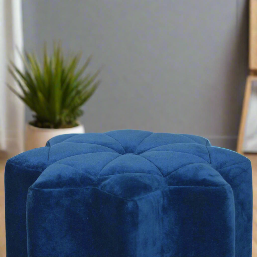 Side profile of the blue velvet star footstool, highlighting its low-profile design and plush velvet finish.
