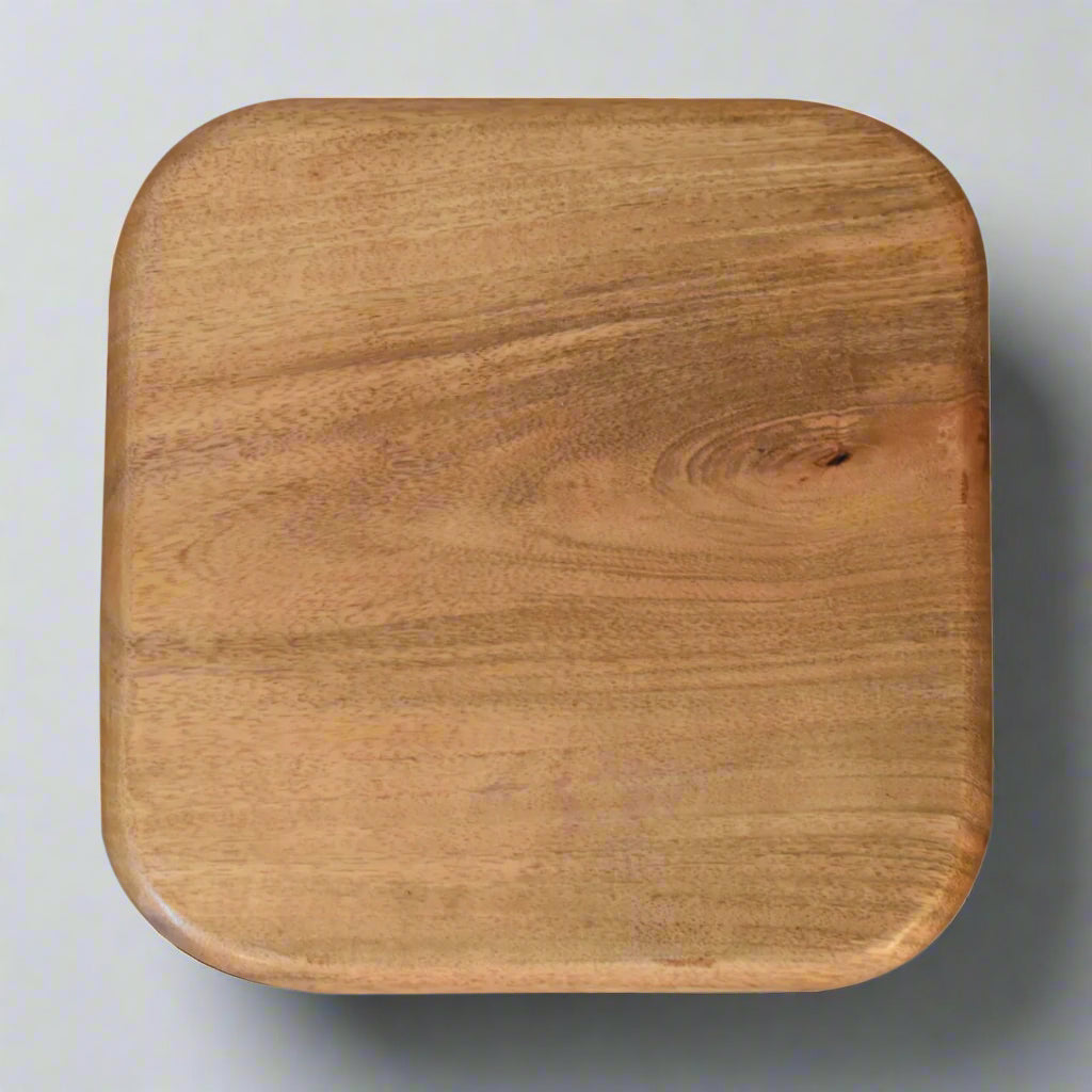 Aerial shot of the underside of one blue and white square bowl, displaying its solid mango wood construction.