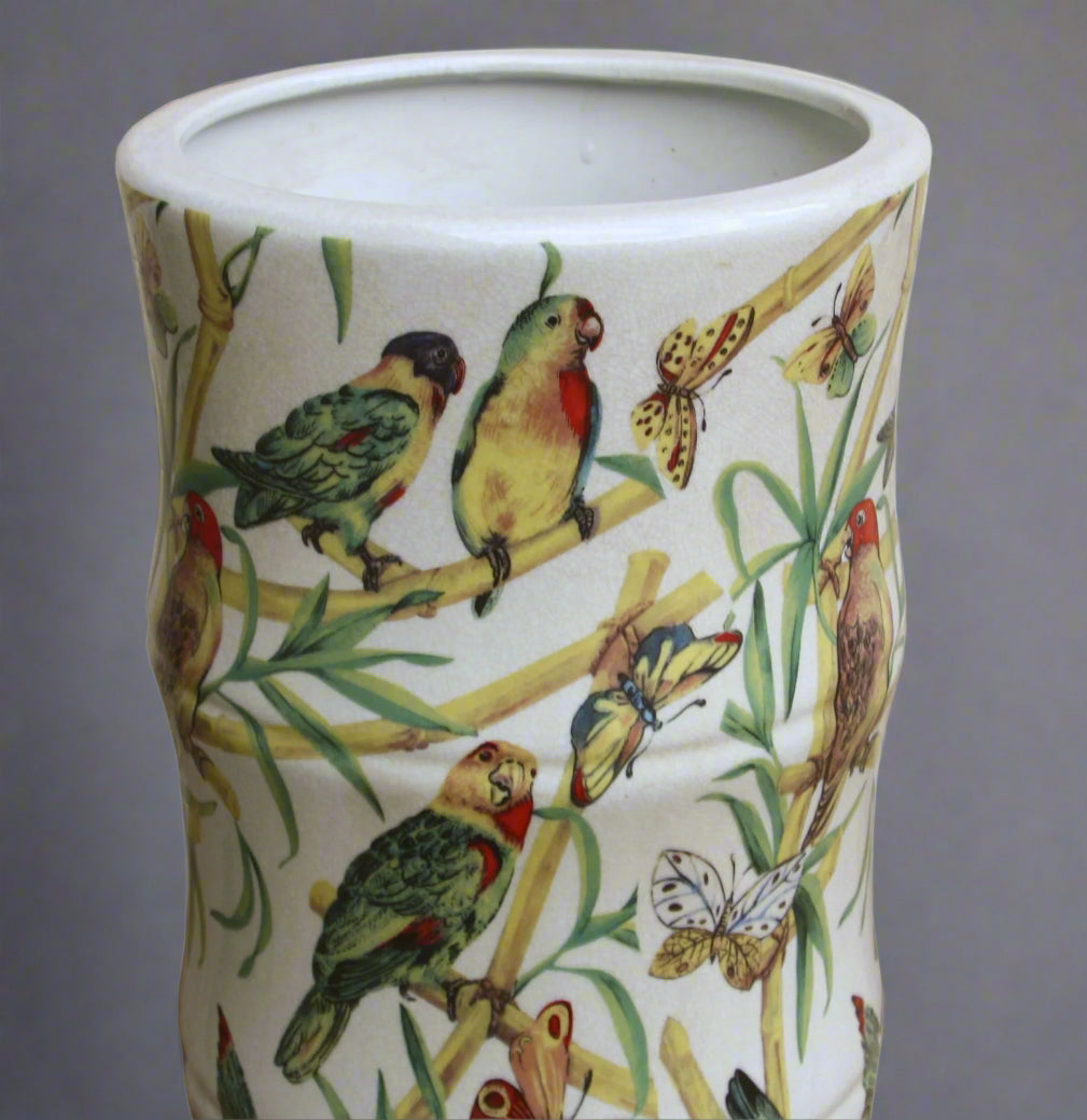 Top view of ceramic umbrella stand showing opening and tropical bird bamboo pattern design for stick storage