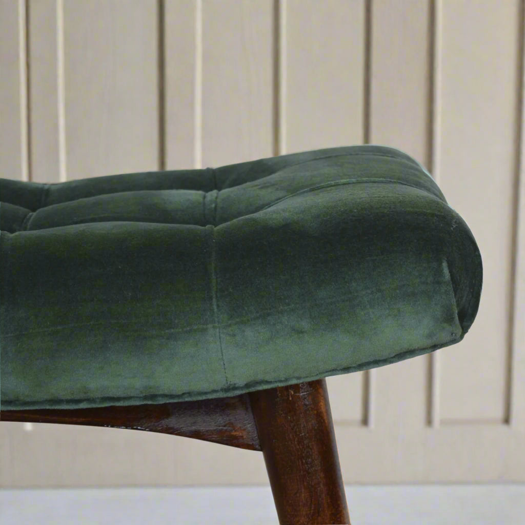 Macro of emerald velvet edge, showcasing smooth pile and seam