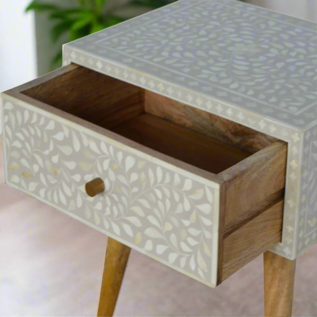 Elevated view of the Floral Bone Inlay 1 Drawer Bedside Table in grey, with its drawer pulled out, revealing generous storage space.