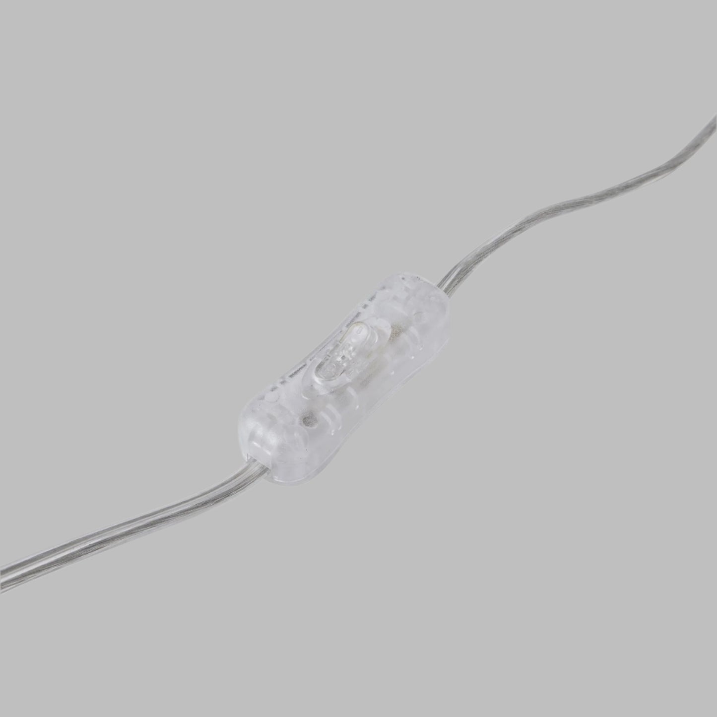 Top-down view of the lamp switch on the Malabar blue ceramic lamp.