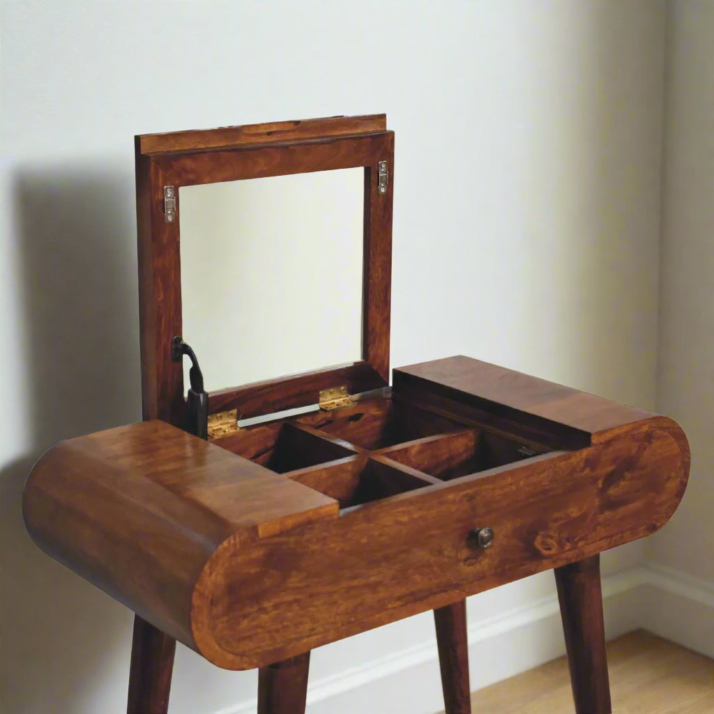 Elevated angled view showing mirror raised and four storage compartments