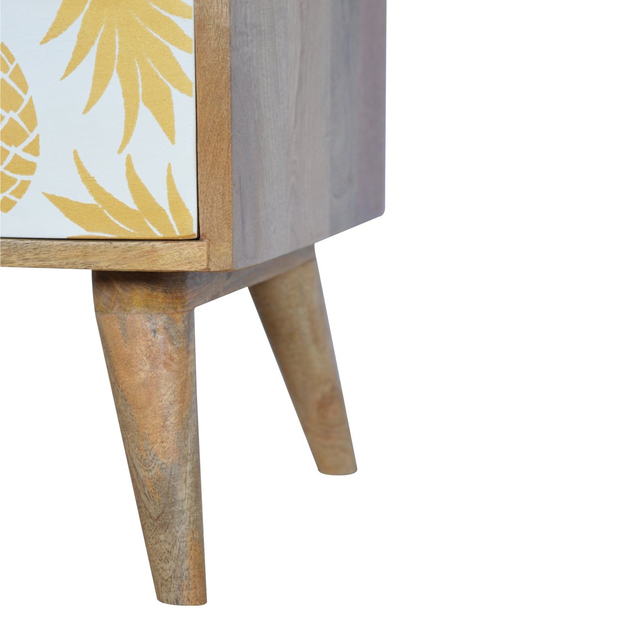 Close-up of the Nordic style leg and lower pineapple screen printed drawer of the mango wood bedside table, highlighting the unique design.