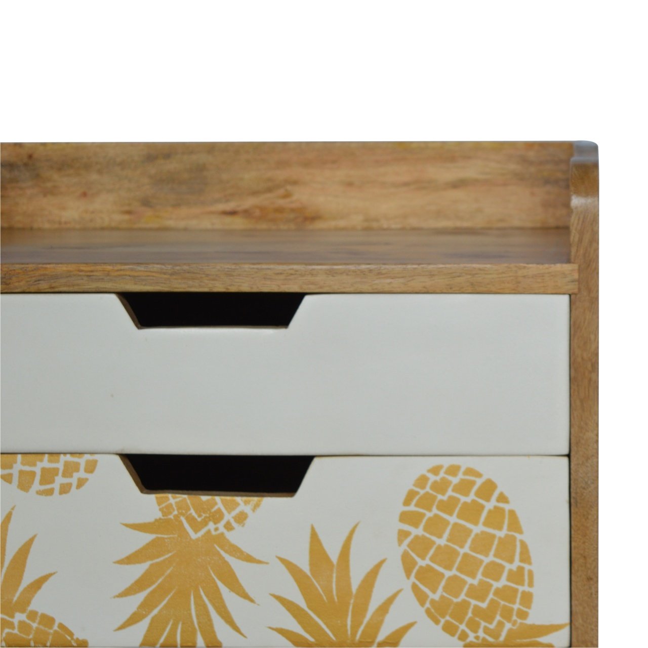 Close-up detail of the top drawers of the Pineapple Screen Print Bedside Table, showing the white hand-painted and pineapple screen-printed cut-out drawers.