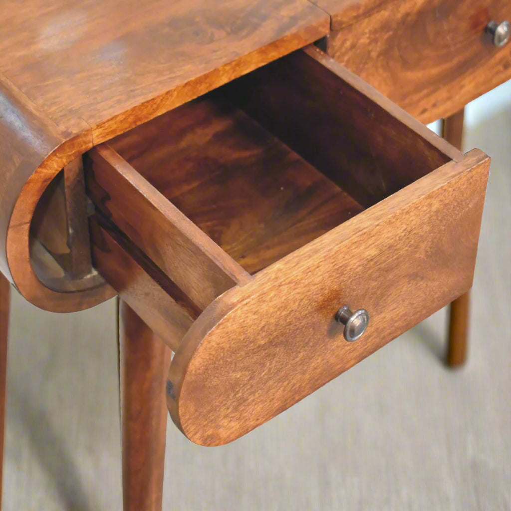 rounded dressing table, with chestnut finish, showing close up of left drawer open.