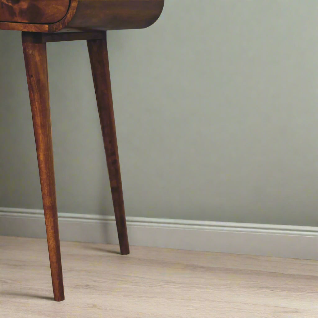 rounded dressing table, with chestnut finish displaying close up of right nordic style legs