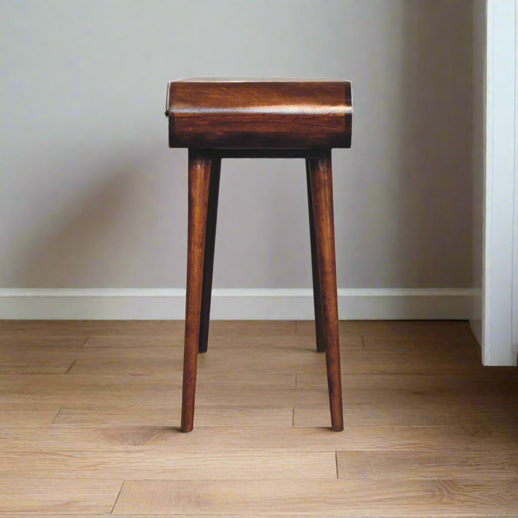Side view of the rounded dressing table, with chestnut finish, displaying smooth rounded table top outline