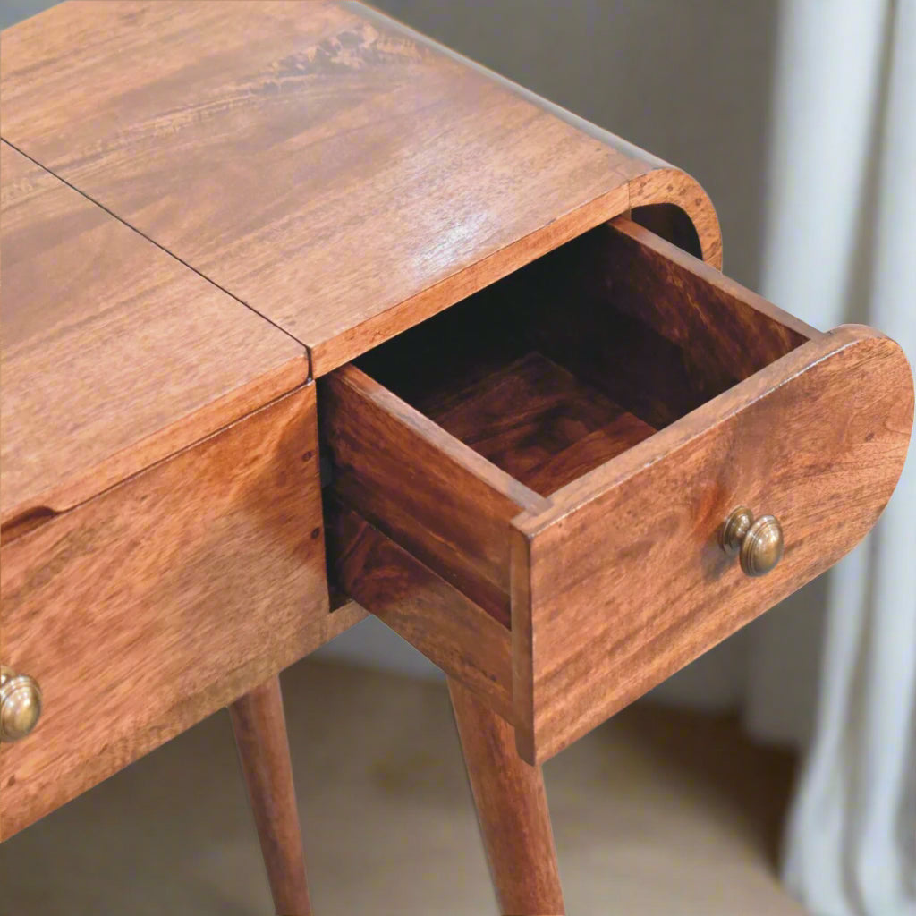 rounded dressing table with honey caramel finish, showing the right side drawer open