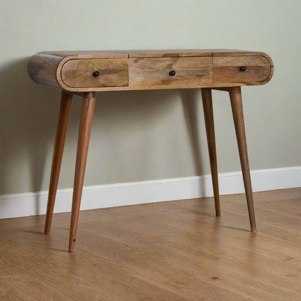 Front angled view of the rounded dressing table, with oak-ish finish