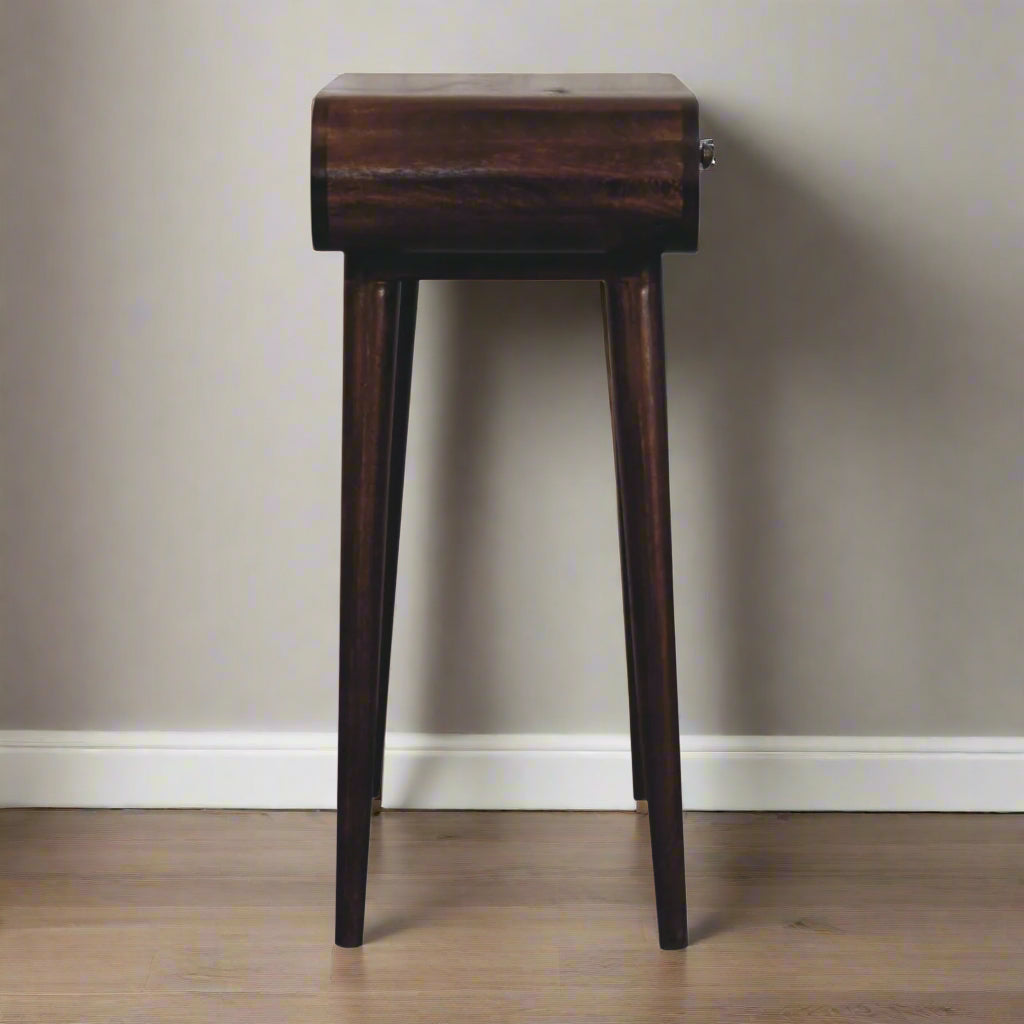 Rounded mini dressing table with california walnut finish, showcasing the table’s side view