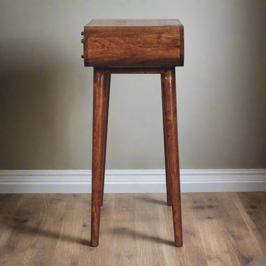 Rounded mini dressing table with honey caramel finish, close up of side view displaying the nordic style legs