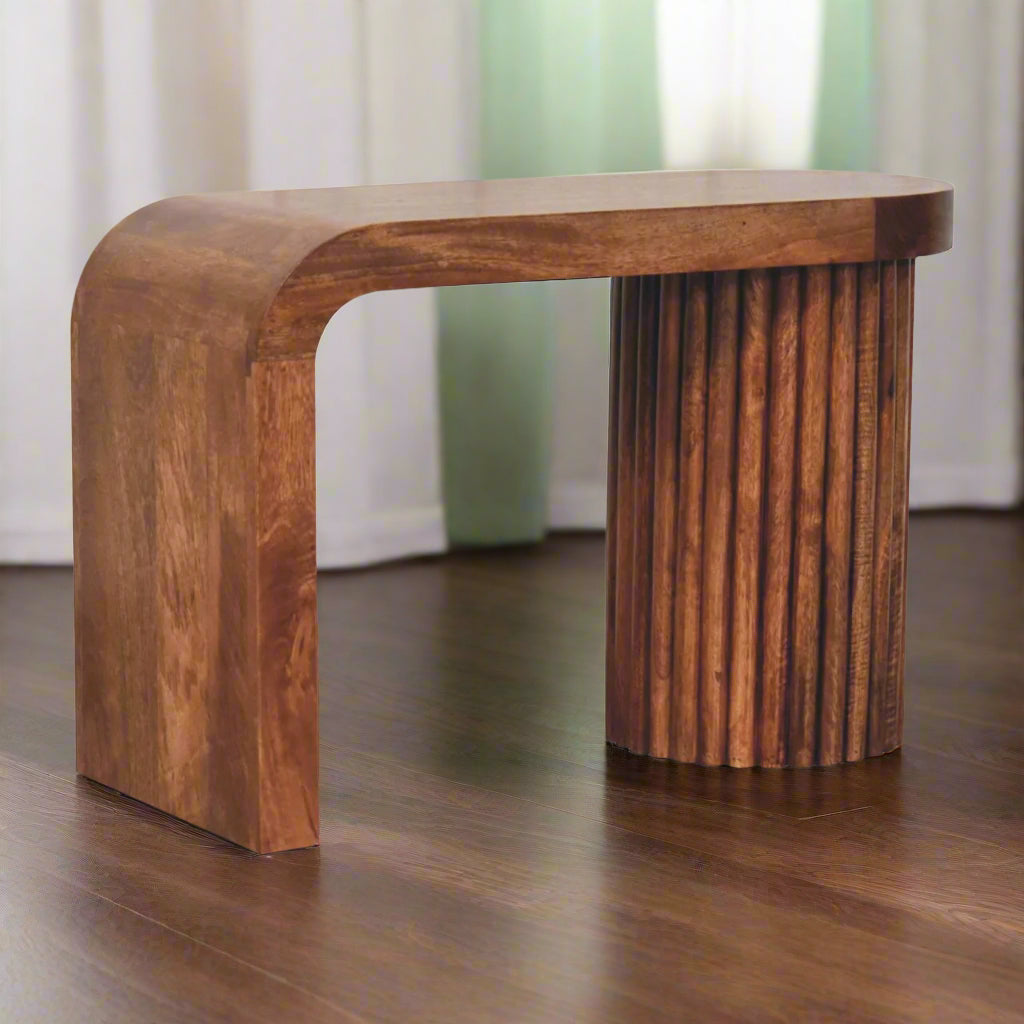 Right angled view of the Serenity Coffee Table, emphasizing its sleek design and solid mango wood construction.
