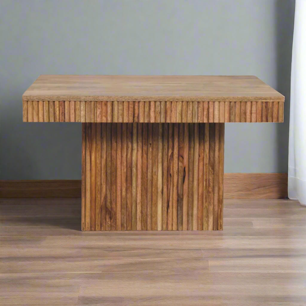 Front view of the Soba Chunky Coffee Table, positioned on a wooden floor, highlighting its design.