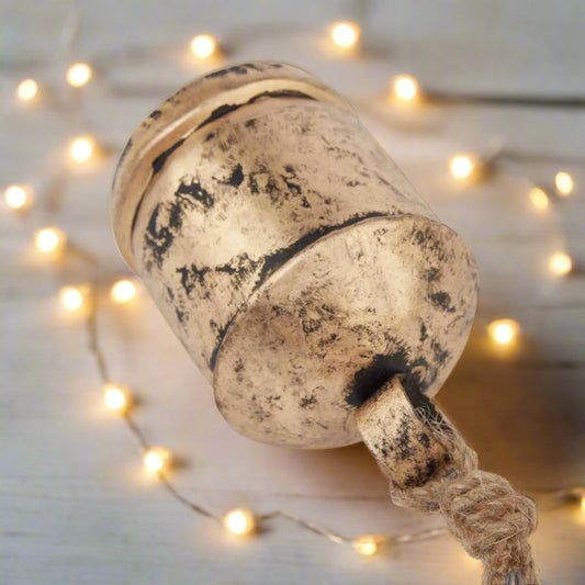 Close up view of Antique Gold Bell Bauble showing top of bauble and tie