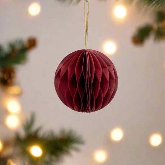 Spherical claret red paper folded hanging decoration, a nod to Christmases of past years. Shop at Purple Flamingo UK
