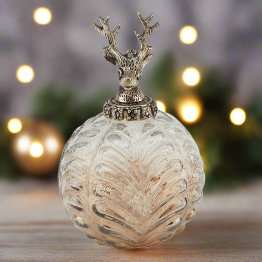 Decorative ombre glass bauble topped with ornamental stag head.