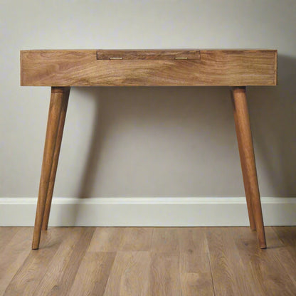 Back view of the cut-out natural dressing table, with oak-ish finish, highlighting  discreet fold-up hinges