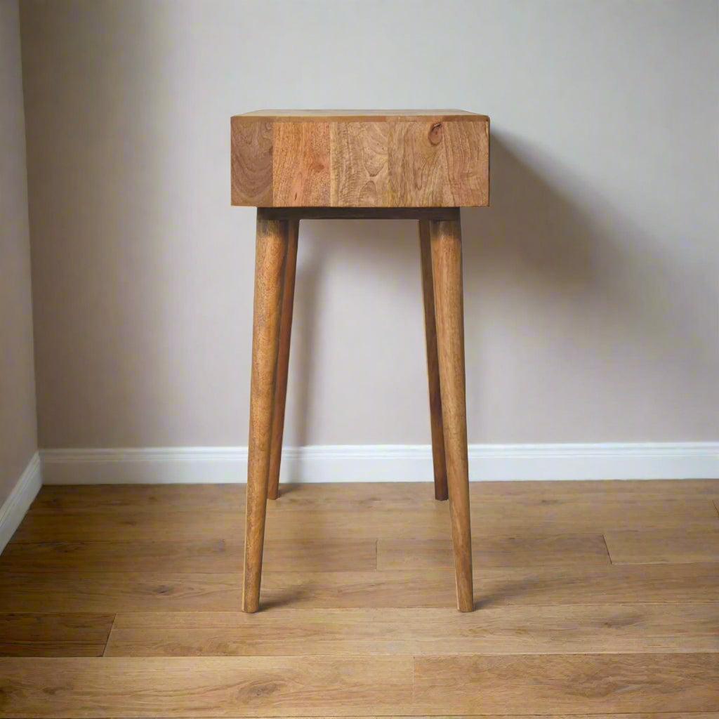 Side view of the cut-out natural dressing table, with oak-ish finish