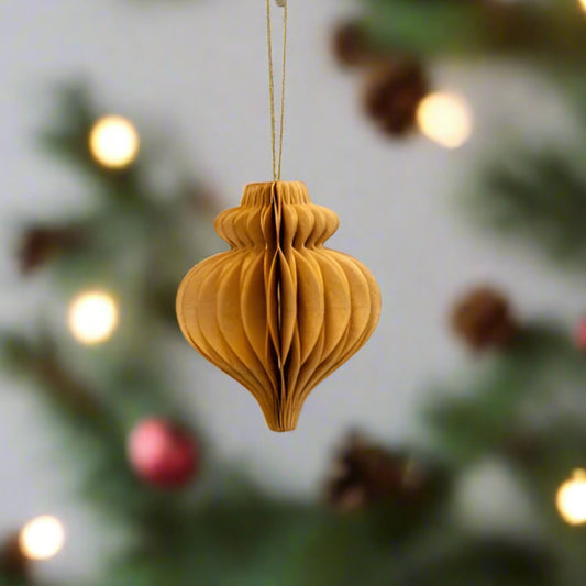 a beautiful caramel coloured teardrop shaped bauble folded in paper inspired by Christmases past, folds and unfolds easily and stores away flat for next season. Buy at Purple Flamingo UK.