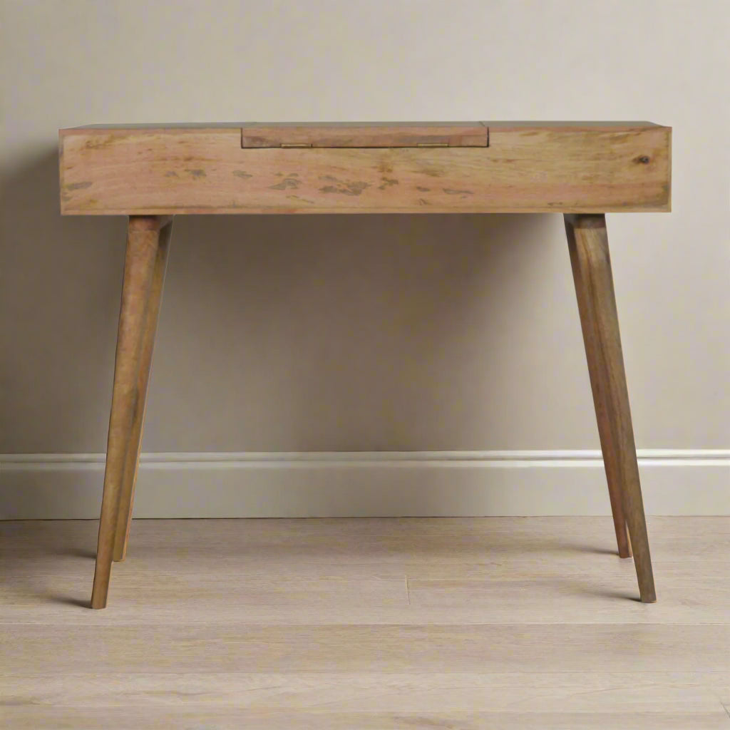 Back view of the lined carved dressing table, displaying discreet fold-up mirror hinges