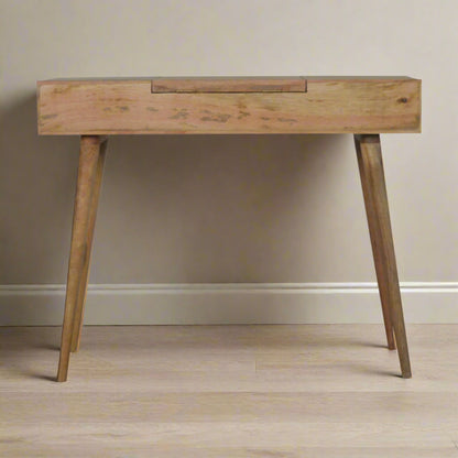 Back view of the lined carved dressing table, displaying discreet fold-up mirror hinges