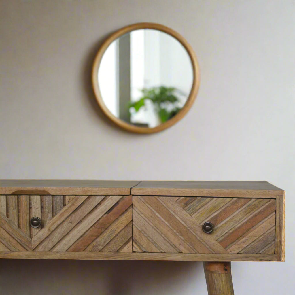  Lined carved dressing table, showcasing the line carving detail of left drawer. Decorative mirror in the background wall.