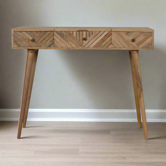 Line carved dressing table, natural finish, front view showing three drawer handles and closed mirror.