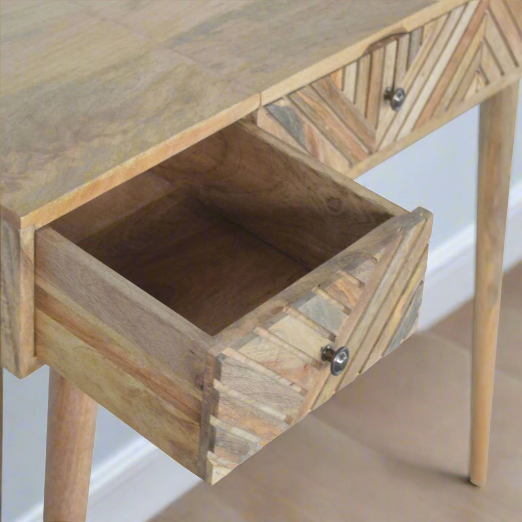 Line carved dressing table, natural finish, front top angled view, displaying open left drawer