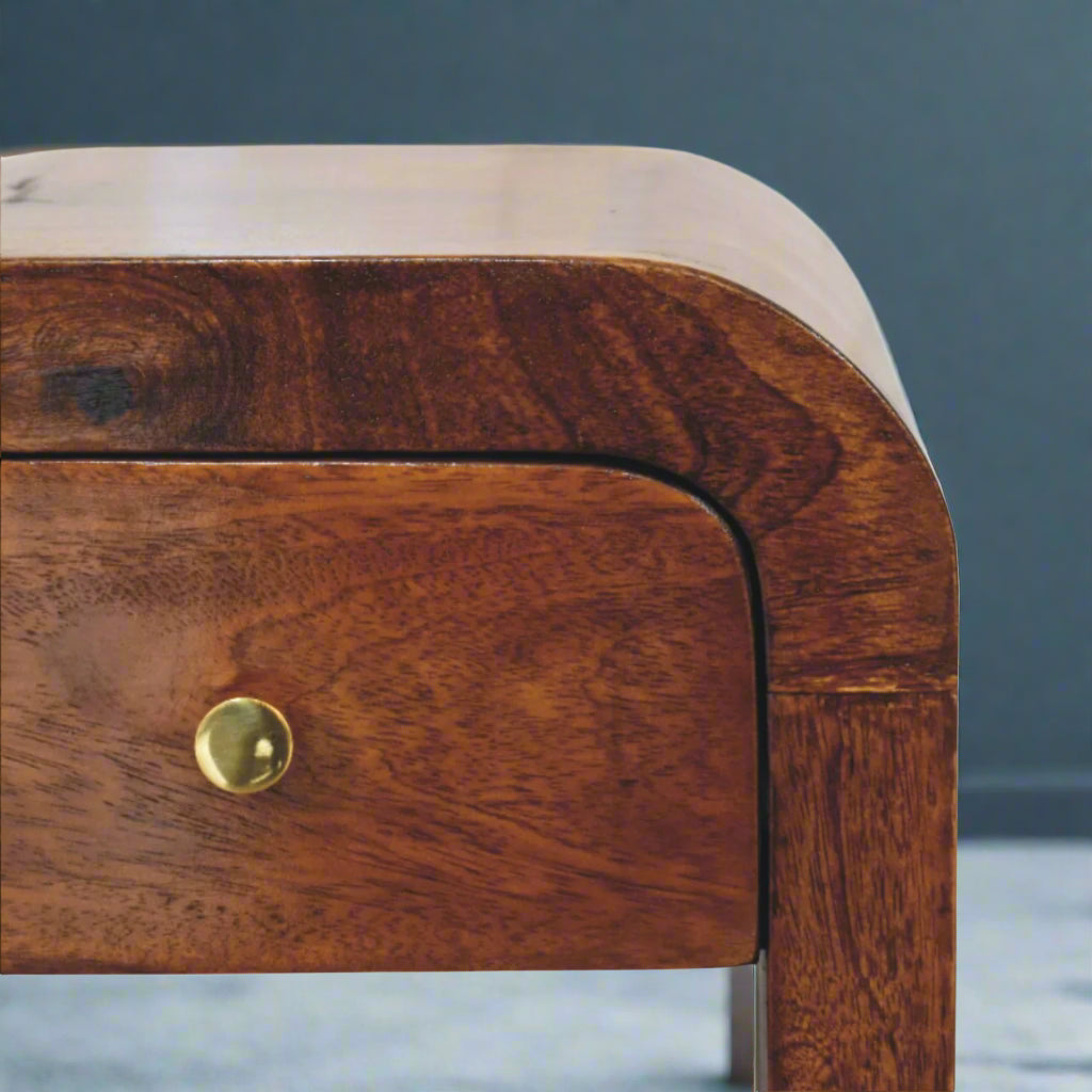 Close-up of the Mini Darcy Chestnut Bedside Table's single drawer with an elegant brass knob.