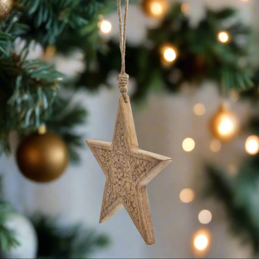 Wooden star hanging decoration with intricate cut pattern, buy at Purple Flamingo UK