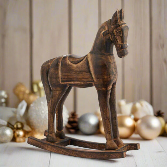 Beautiful wooden rocking horse ornament with a cream and gold festive background, buy at Purple flamingo UK