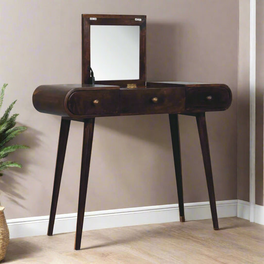 Front angled view of the rounded dressing table, with California walnut finish, showcasing the fold-up mirror open