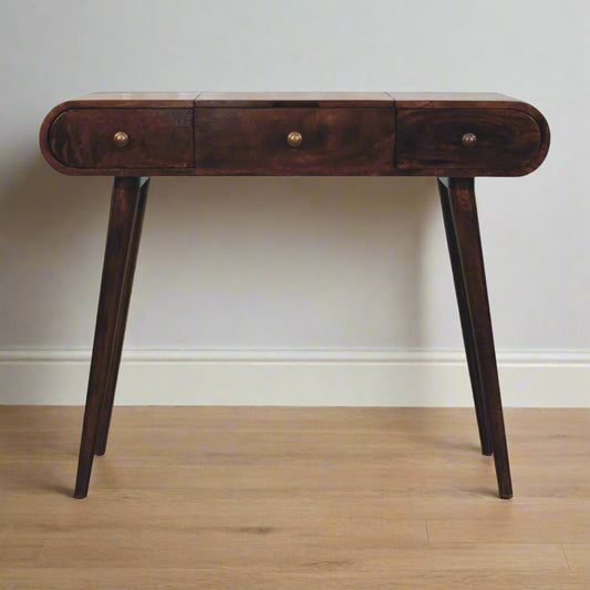 Front view of the rounded dressing table, with California walnut finish and nordic style legs.