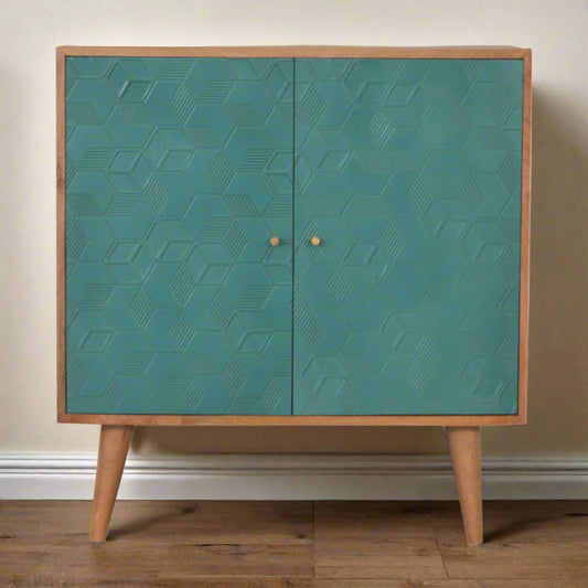 Front view of the Acadia Teal Cupboard, showcasing its teal cube design, solid mango wood, and shiny brass knobs.
