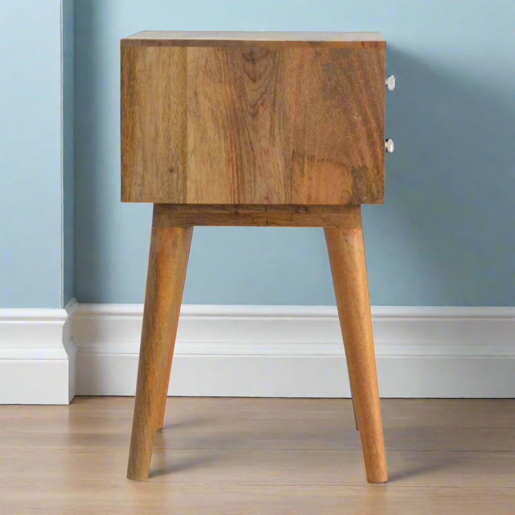 Side view of the Blue Floral Screen Print 2 Drawer Bedside Table, highlighting its slender profile and mango wood construction.