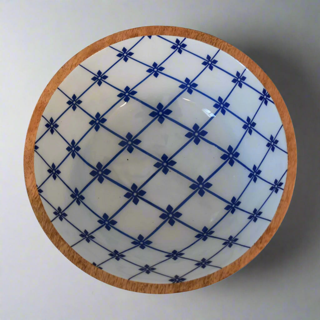 Close aerial of one bowl showcasing detailed floral lacquer