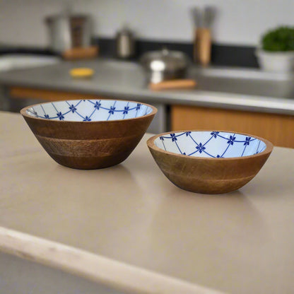 Eye‑level shot of bowls displaying wood grain exteriors in kitchen setting
