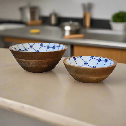 Eye‑level shot of bowls displaying wood grain exteriors in kitchen setting
