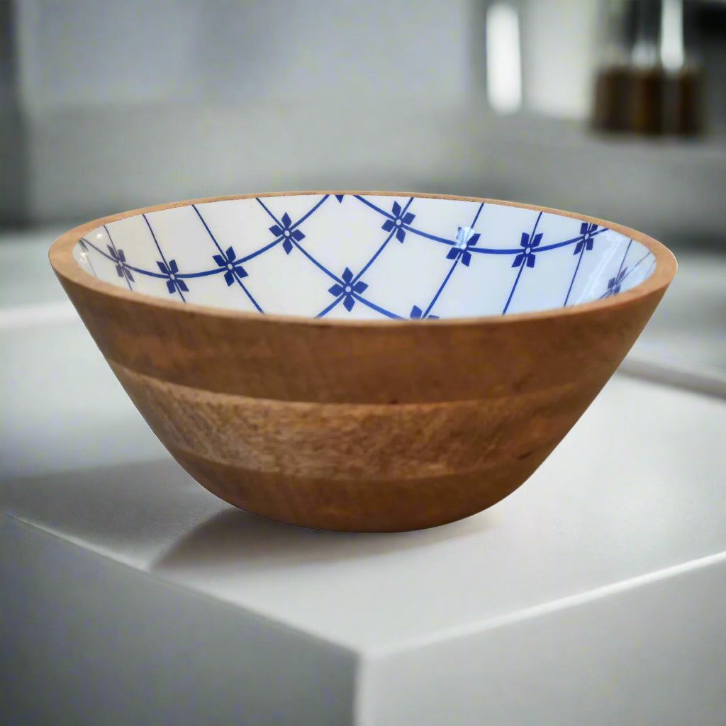 Side profile of a single bowl highlighting rich mango wood grain