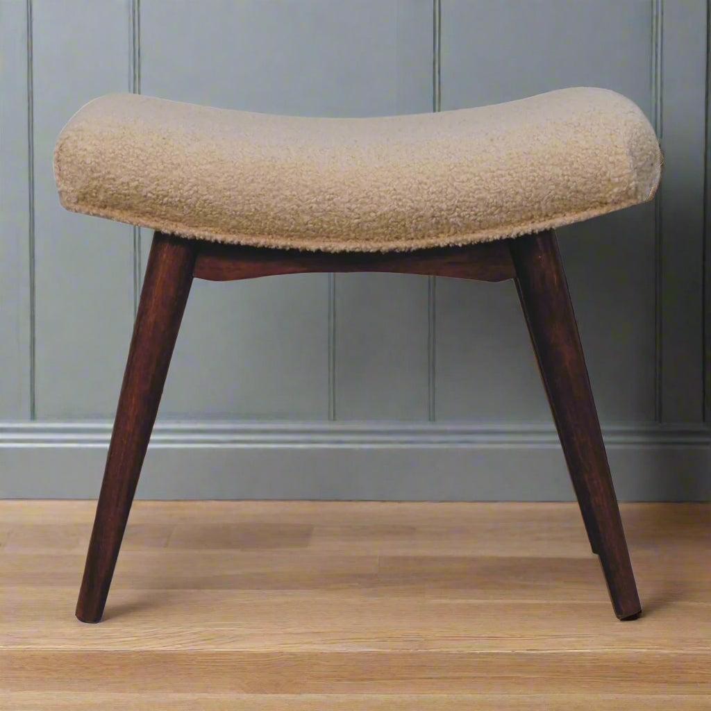 Front view of the Boucle Cream Curve Stool, showcasing its upholstered cream boucle seat and the front Nordic style legs.