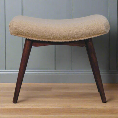 Front view of the Boucle Cream Curve Stool, showcasing its upholstered cream boucle seat and the front Nordic style legs.