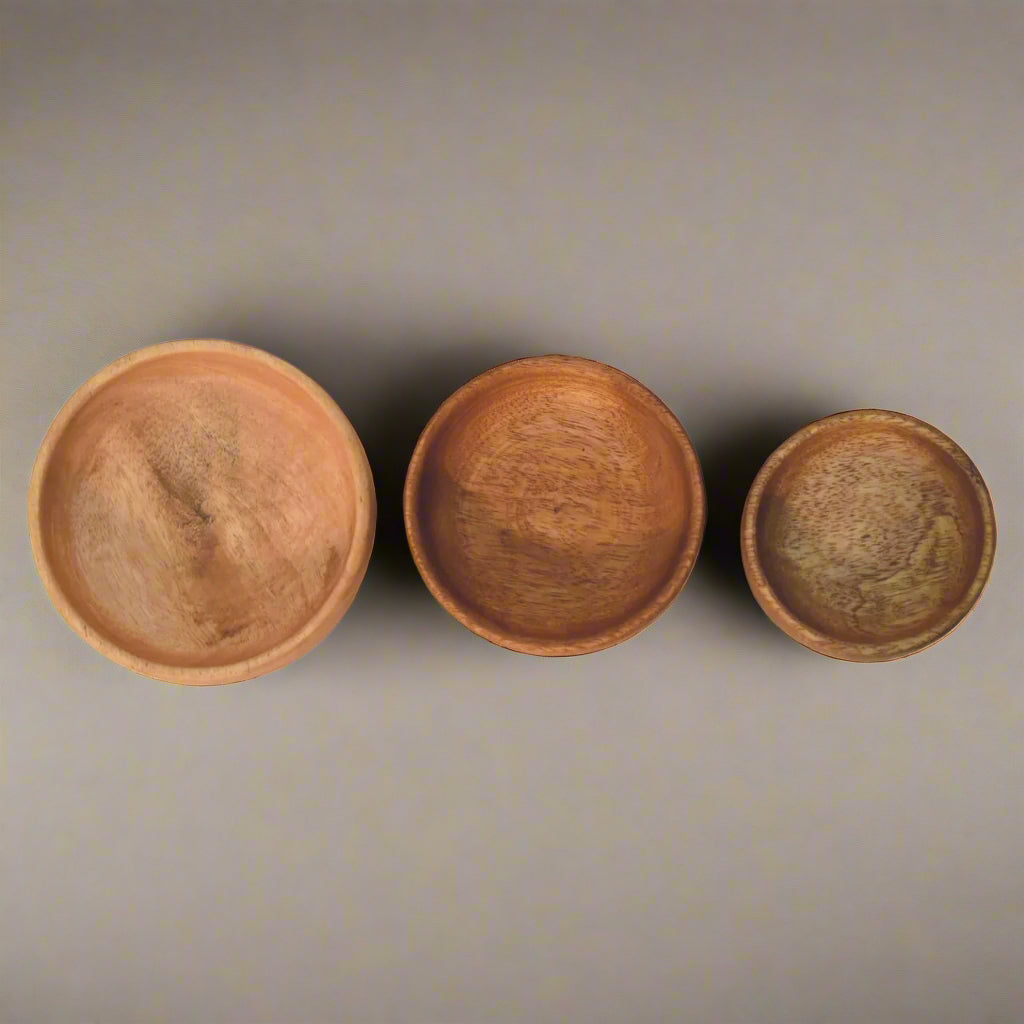 Top-down view showing all three bowls arranged by size – rustic and minimal.
