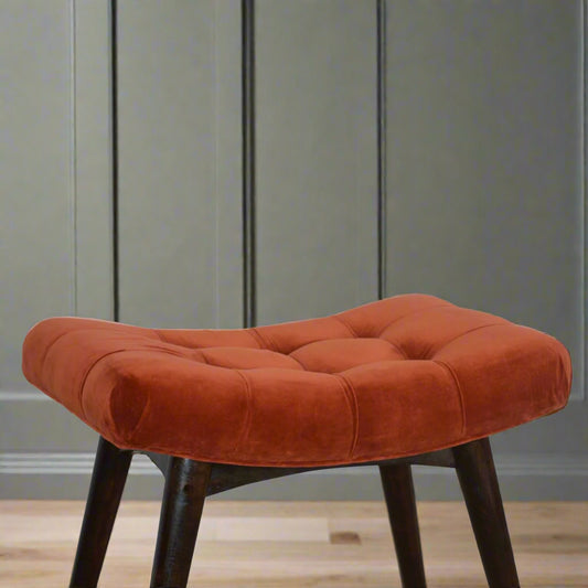 Elevated shot highlighting seat upholstery and leg connection