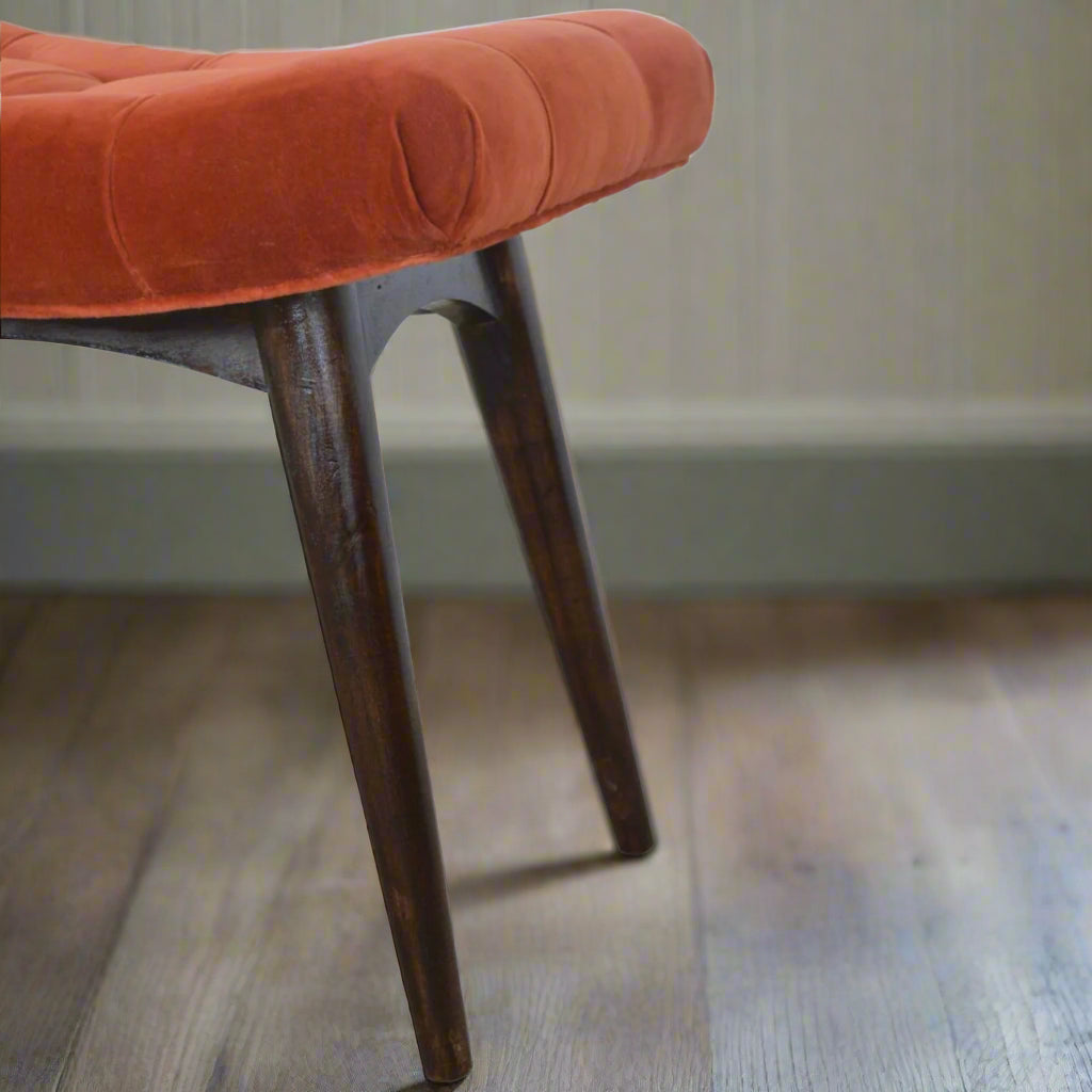 Side close‑up of left legs and seat edge
